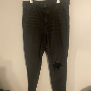 High Waisted Black Skinny Jeans with a Knee Hole